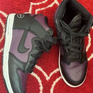 Nike Black and Purple High-Top Sneakers with Orange Accent